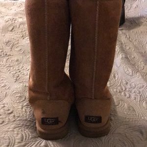 I am selling long classic UGG boots in a size 7.